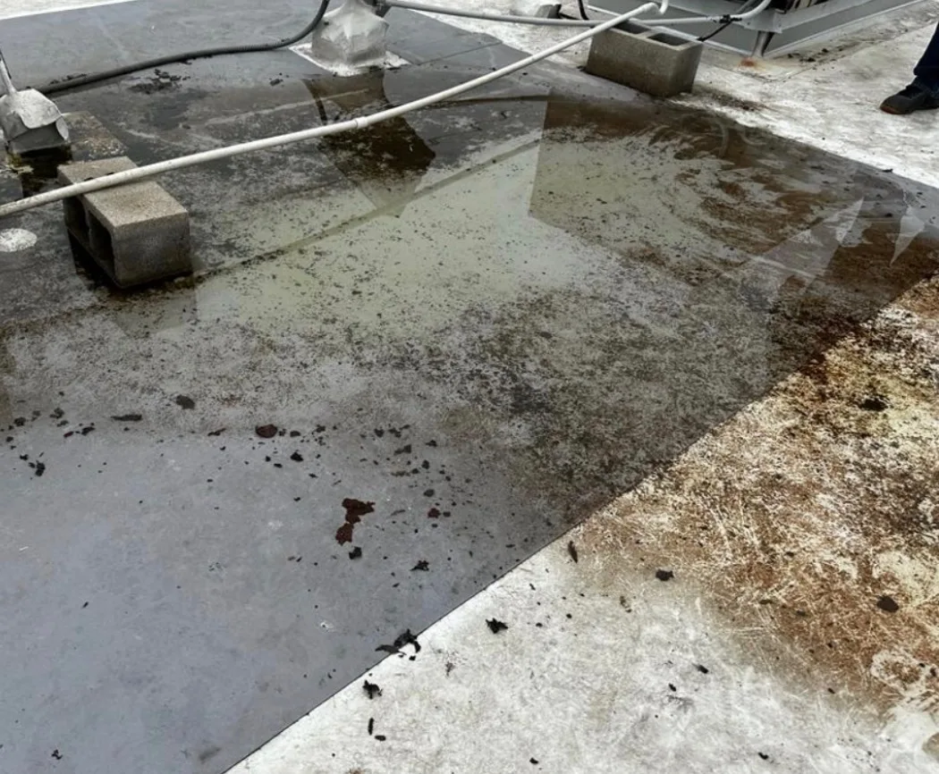 Ponding water on a low-slope commercial roof