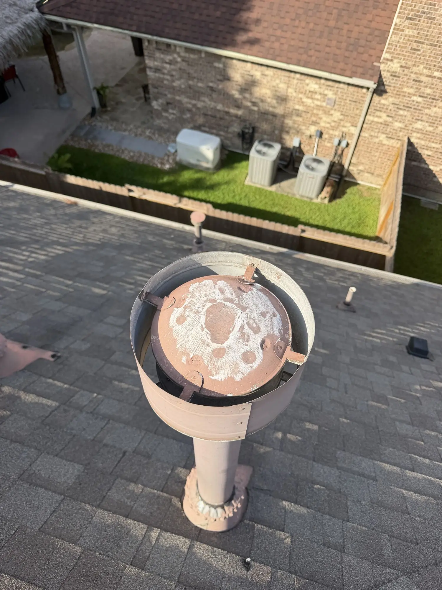 Hail spatter and dents on a vent cap