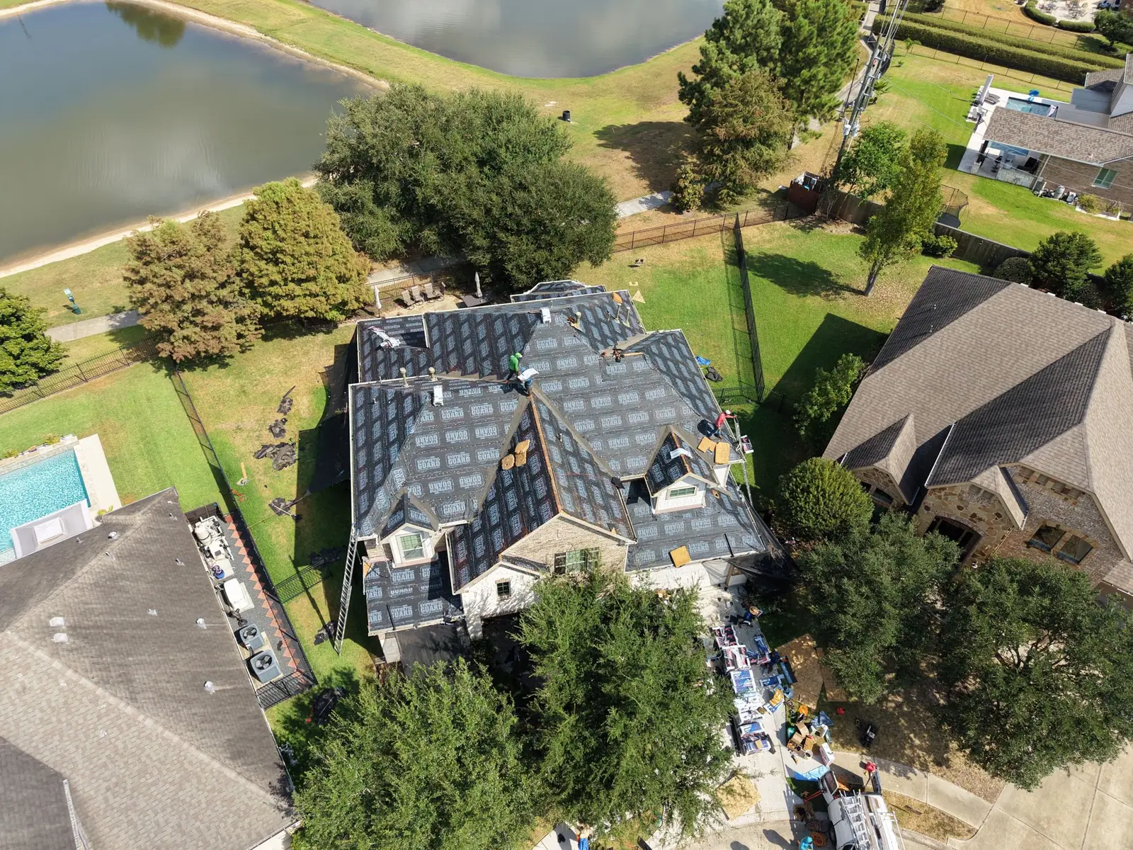 New shingles going on a lake-view home
